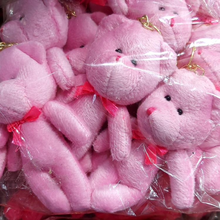 خرید عروسک خرسی کوچک صورتی با روبان قرمز مناسب هدیه